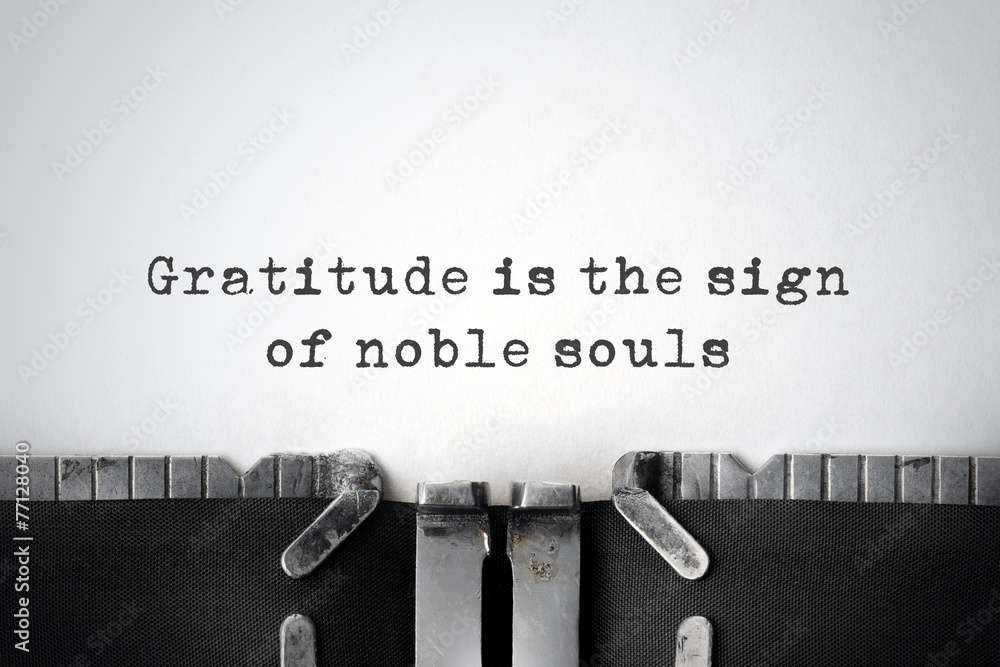 Gratitude. Inspirational quote typed on an old typewriter.