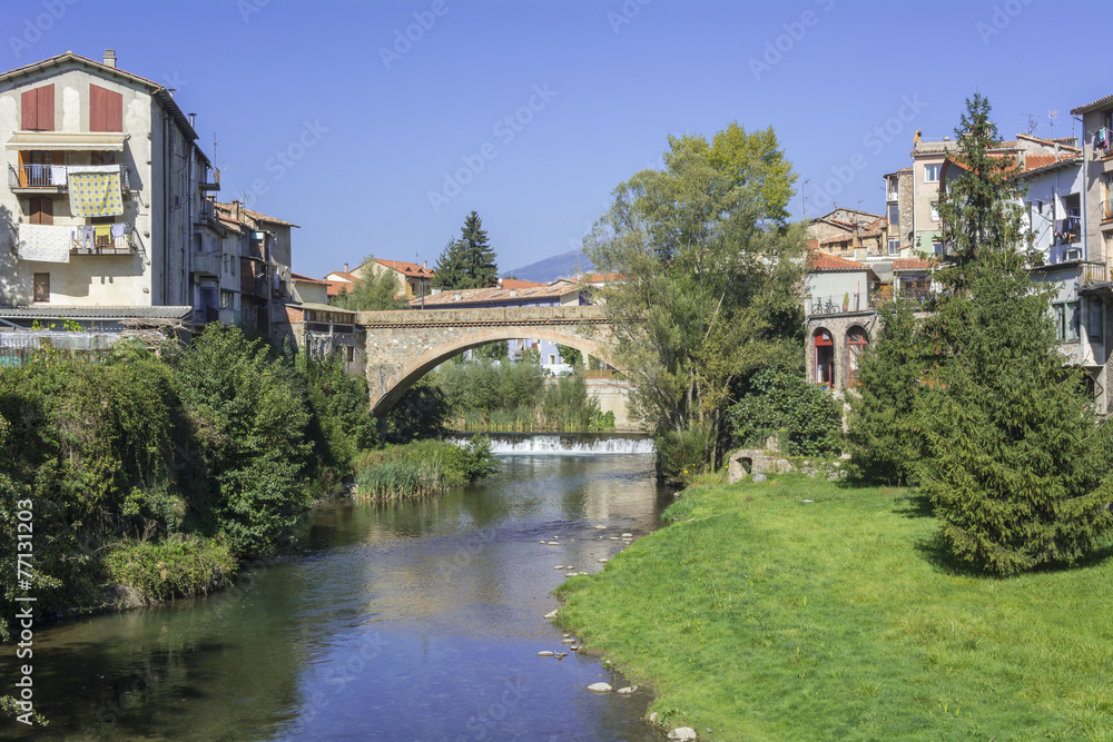 Landscape river bridge in the village of Ripoll