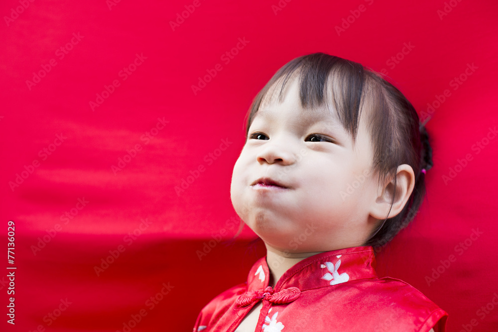 China girl in traditional Chinese red Tang suit greeting China girl in traditional Chinese red Tang suit greeting