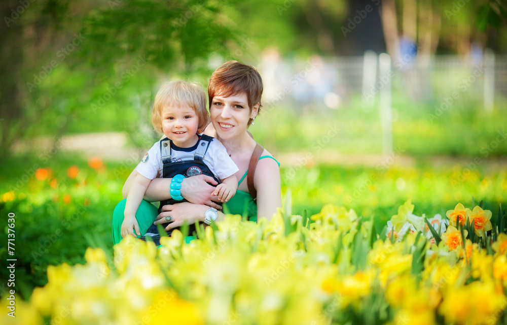 Fototapeta premium the girl with the son outdoors