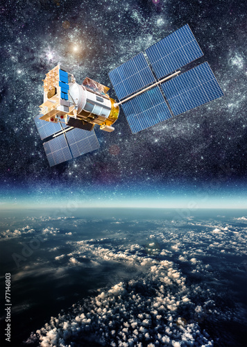 Space satellite over the planet earth