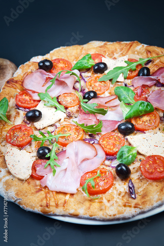Italian prosciutto and rucola pizza.
