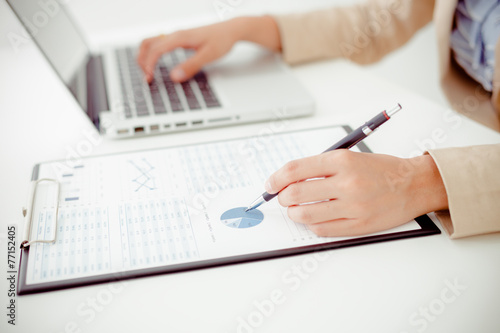 woman hand with business report