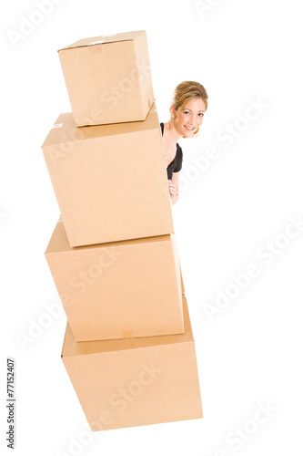 Boxes: Peeking From Behind Large Stack of Boxes