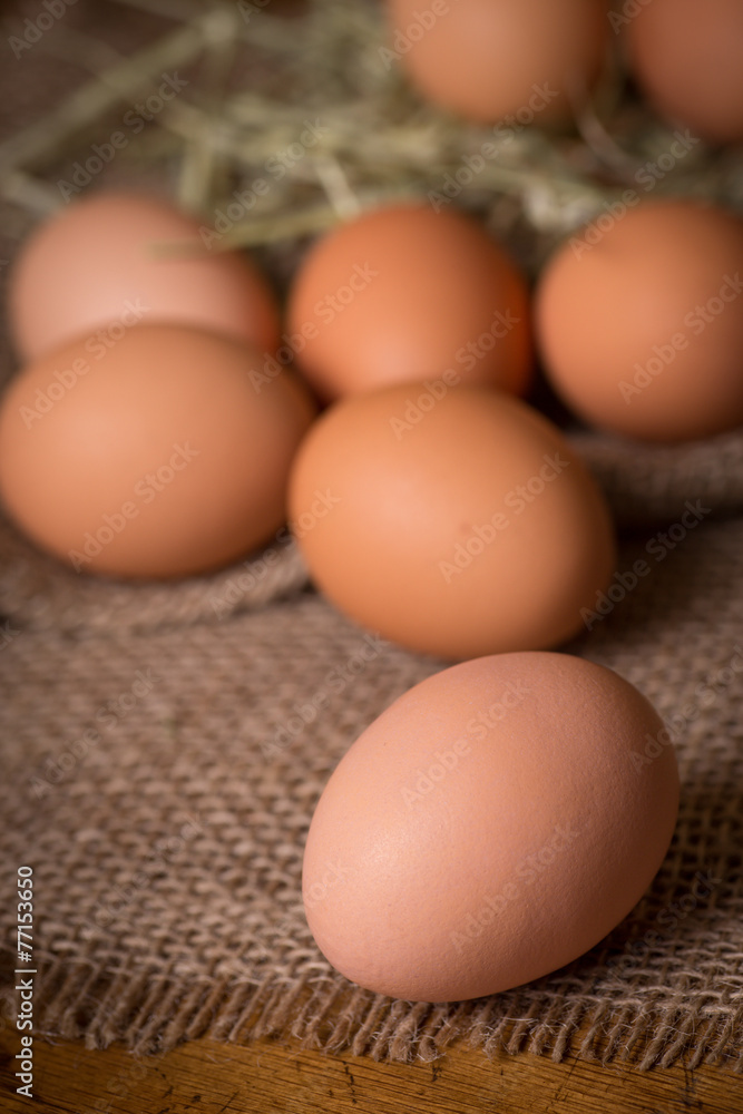Organic brown eggs in rustic setting Organic brown eggs in rustic setting