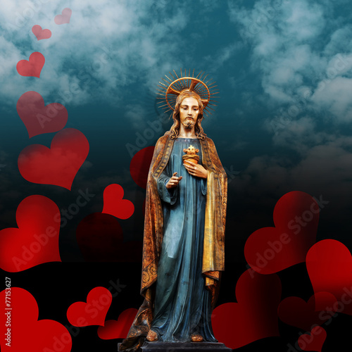 jesus christ statue,hearts,clouds and sky background photo