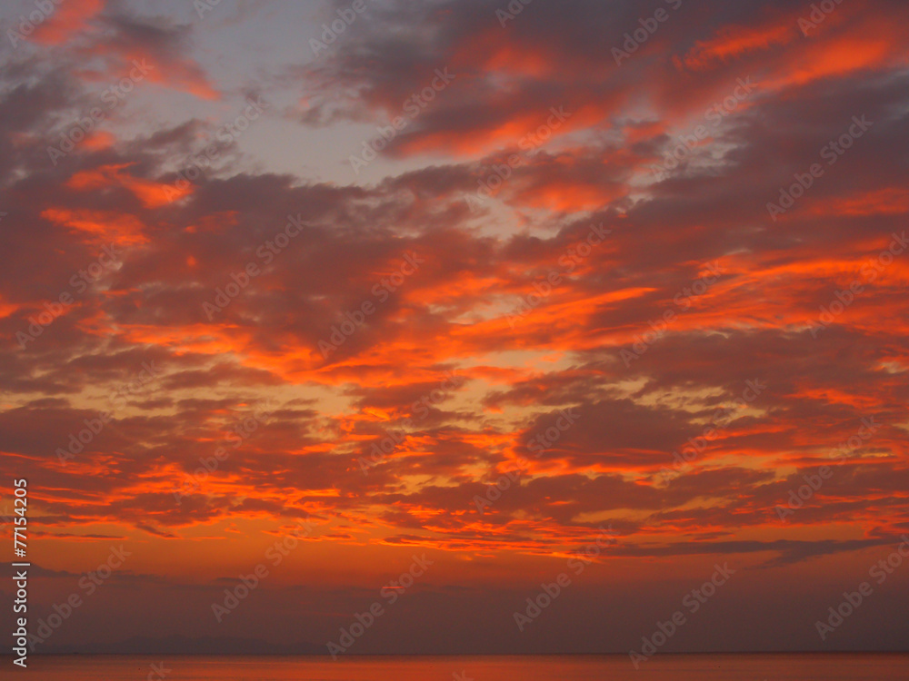 Beautiful red sunset on an ocean.