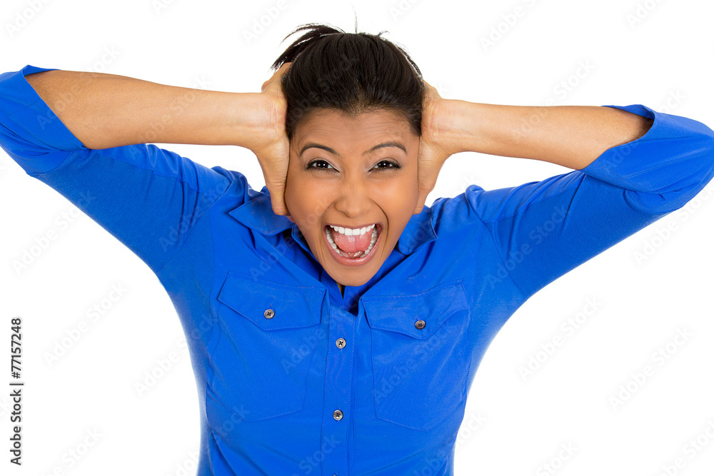 Frustrated stressed young woman having headache screaming Frustrated stressed young woman having headache screaming