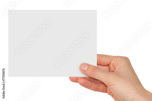 hand holding a blank white card