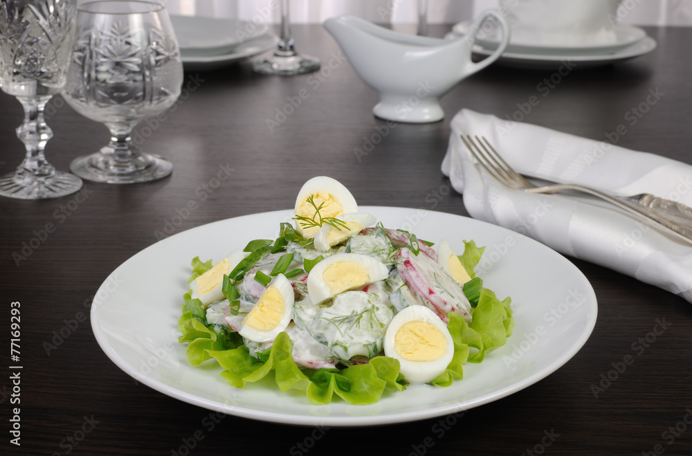 Radish salad with cucumber and eggs for milk sauce