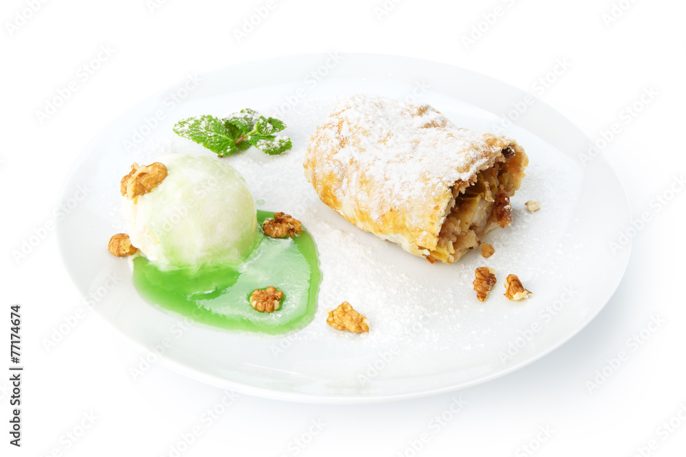 Restaurant food isolated - apple strudel with mint sauce, ice cr Restaurant food isolated - apple strudel with mint sauce, ice cr