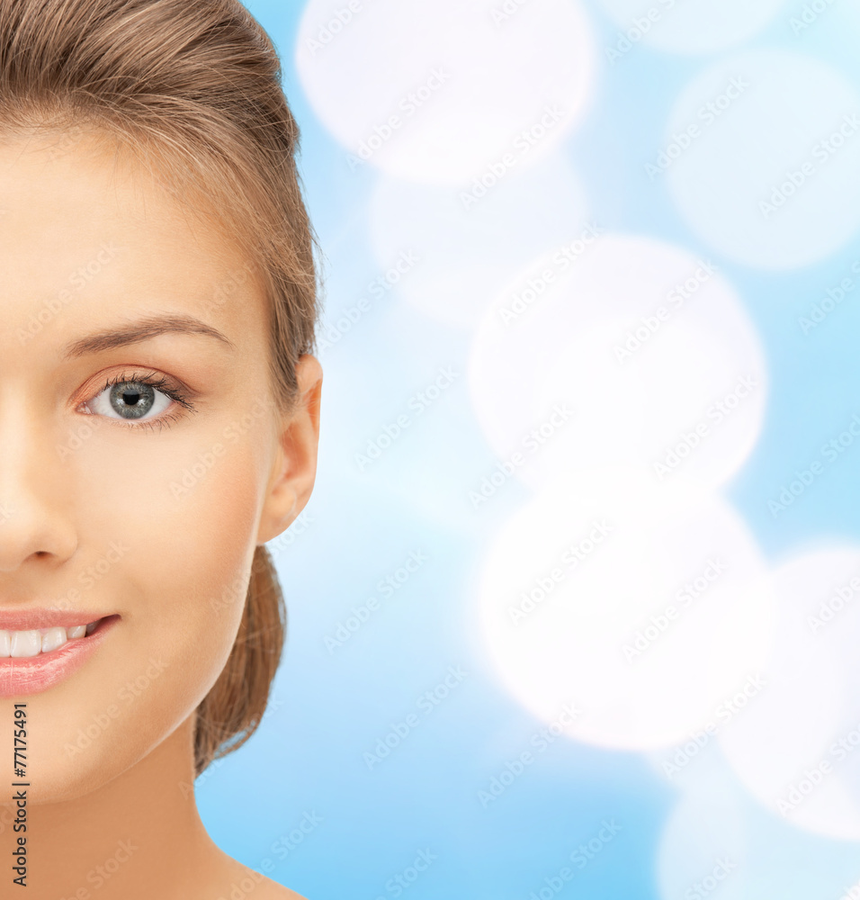 Fototapeta premium beautiful young woman half face
