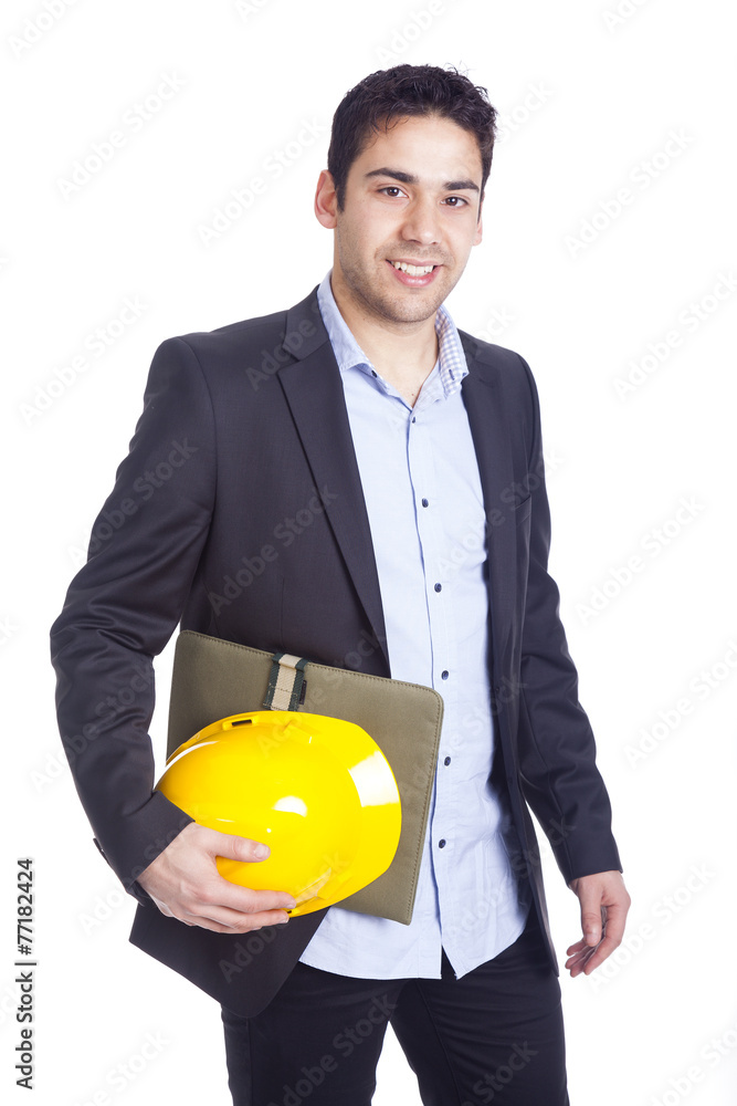 Young architect holding a helmet and a folder on a white backgro Young architect holding a helmet and a folder on a white backgro