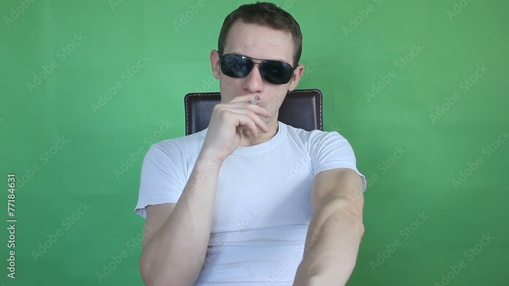 young man smoking green screen young man smoking green screen