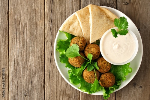 Plate of falafel with pita bread and tzatziki sauce