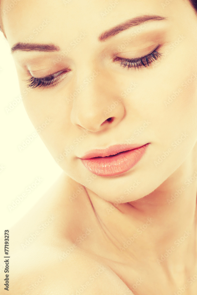 Woman's fresh, skin face and bare shoulders. Woman's fresh, skin face and bare shoulders.