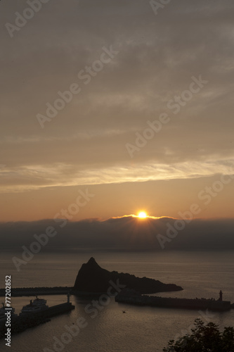 olden sunset with reflection on the sea