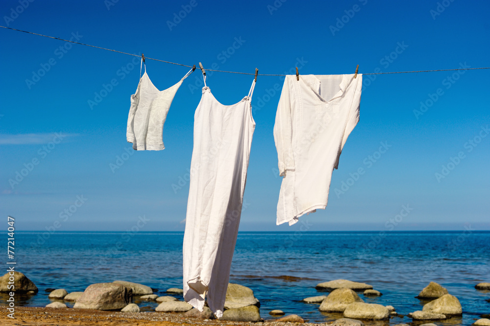 White shirts hanging on a rope