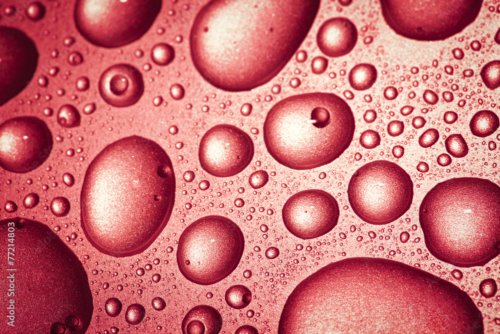 red water drops background red water drops background