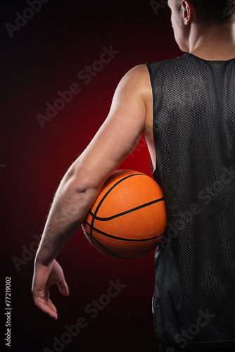 Close up of Caucasian basketball player holding the ball © Friends Stock