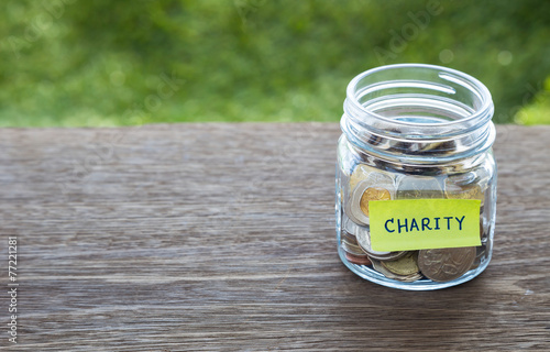 Charity donation money glass jar