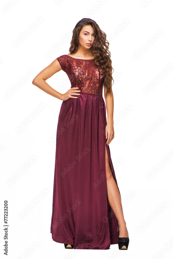 Attractive young woman wearing evening dress