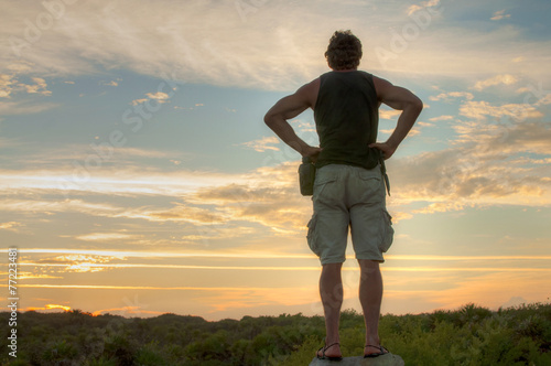 Explorer observing landscape