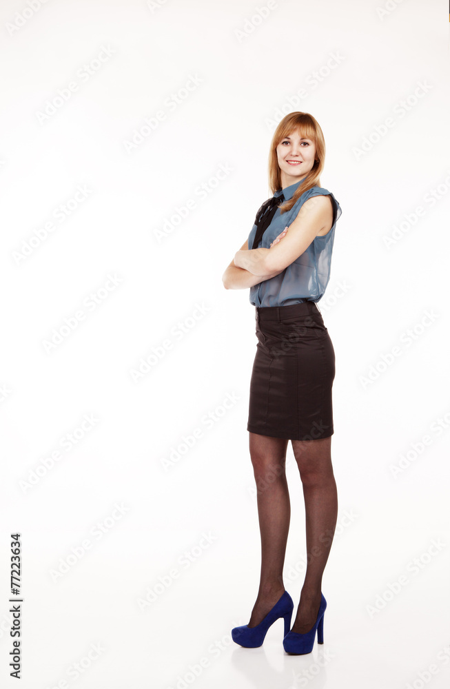 young beautiful woman in blue blouse and black skirt young beautiful woman in blue blouse and black skirt