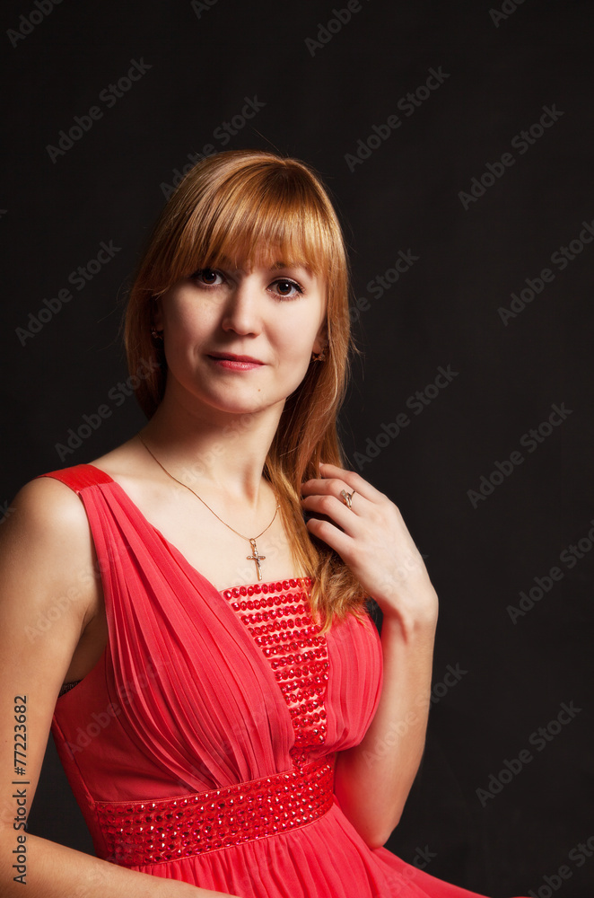beautiful young woman in a red dress beautiful young woman in a red dress