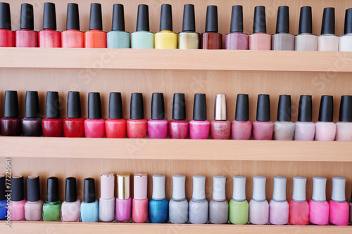 Close up of colorful nail polish bottles