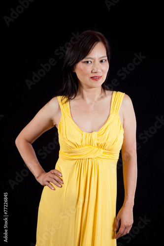 Asian woman with a thoughtful expression