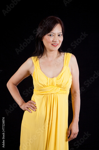 Asian woman smiling at the camera
