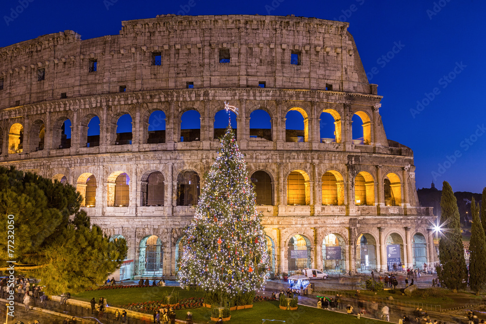Naklejka premium Colosseum in Rome at Christmas during sunset, Italy