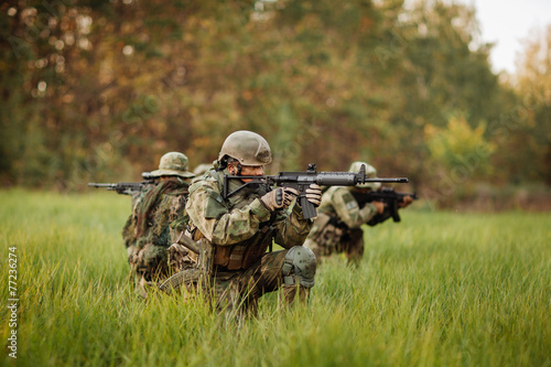 soldiers shoot at the enemy