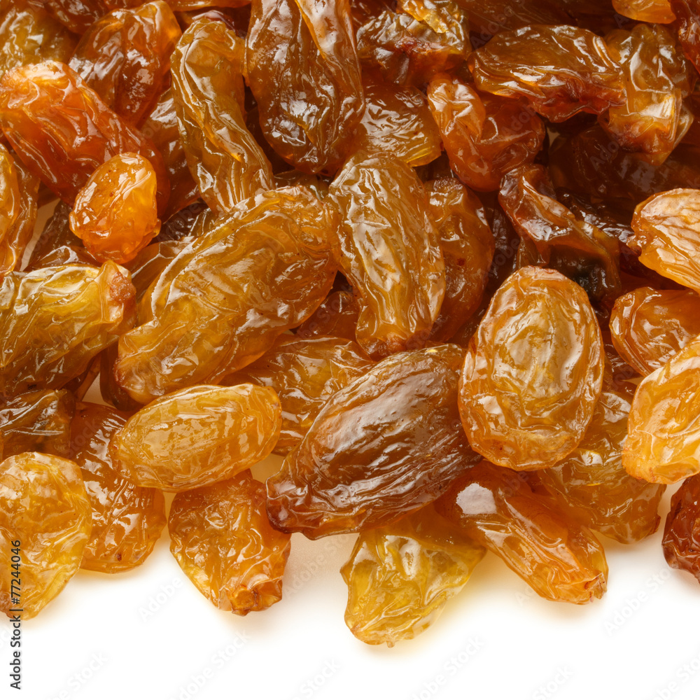 Yellow sultanas raisins isolated on white background cutout