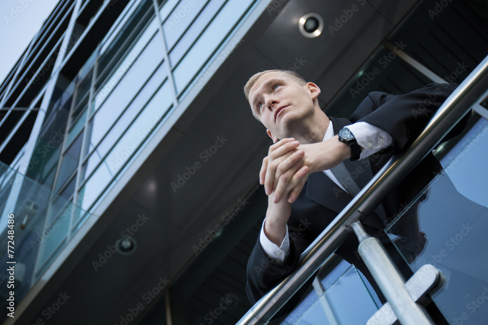 Standing at the balcony and thinking Standing at the balcony and thinking