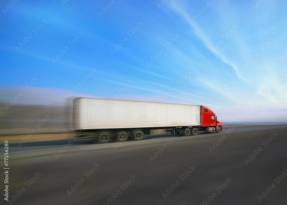 trailer with red cabin goes on the highway trailer with red cabin goes on the highway