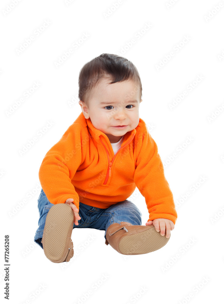 Adorable six month baby with orange jersey Adorable six month baby with orange jersey
