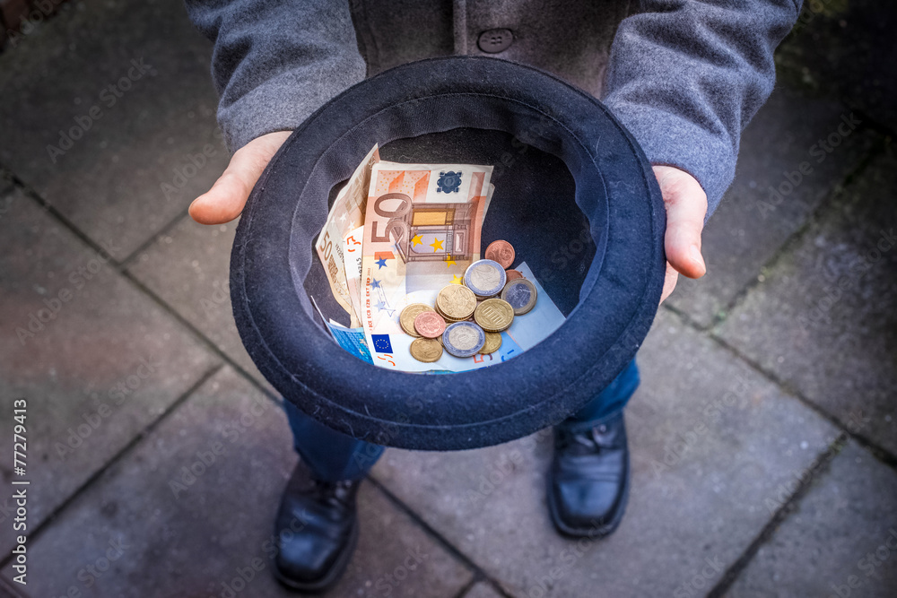 Geld sammeln StockFoto Adobe Stock