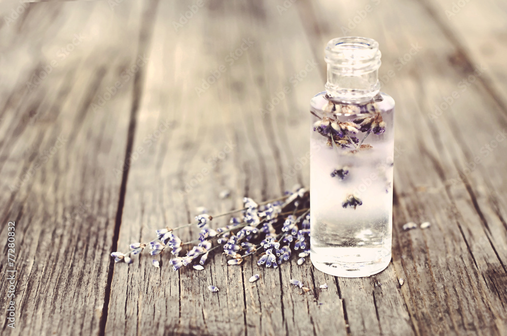 Fototapeta premium Lavender flowers and glass bottles