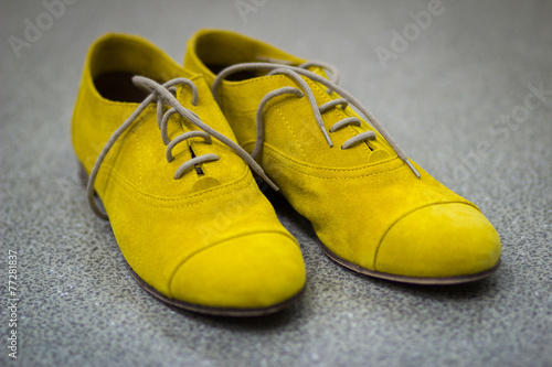 Yellow suede shoes for stylish women.