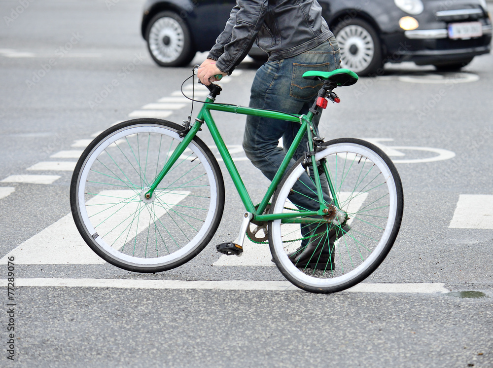 Man off bike in traffic Man off bike in traffic
