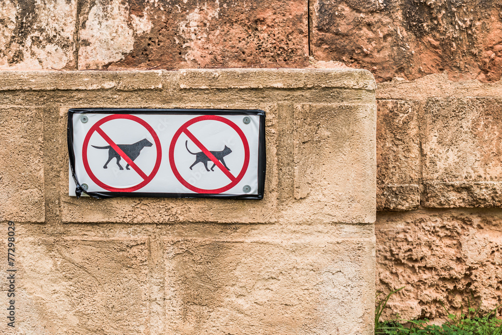 No Pets Allowed Signs on Old Textured Wall No Pets Allowed Signs on Old Textured Wall