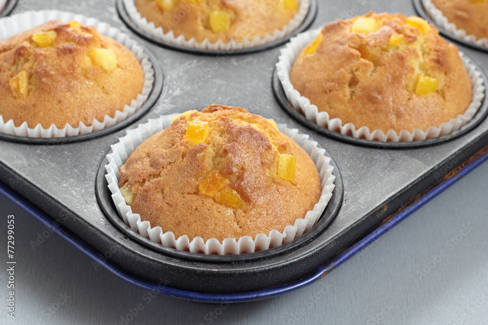 Muffins with orange zest just taken from the oven. Muffins with orange zest just taken from the oven.
