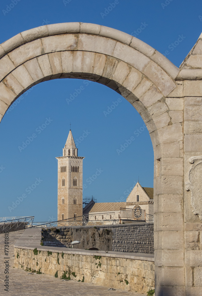 Belfry of the Trani cathedral seen through an arch