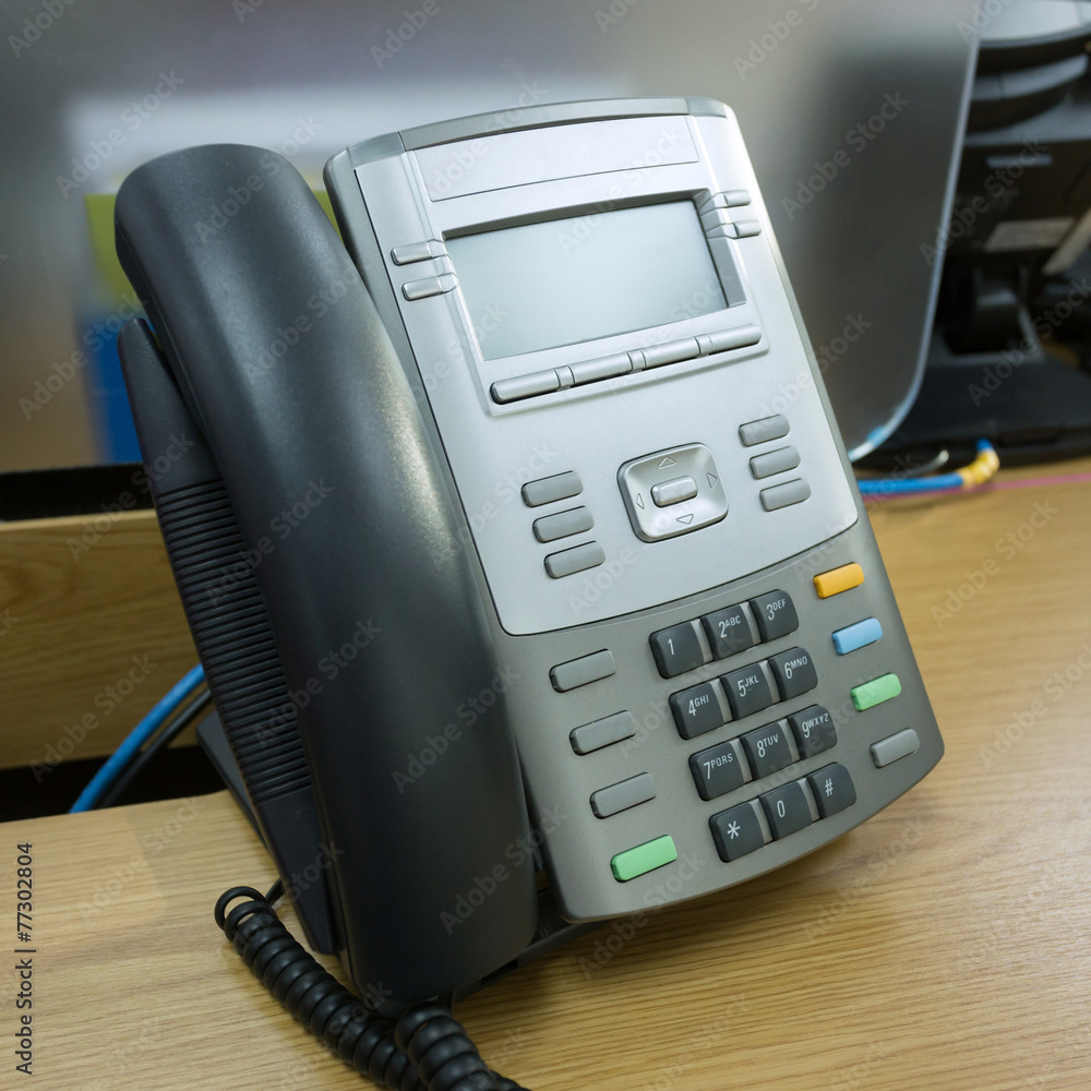 black telephone on table work of office black telephone on table work of office