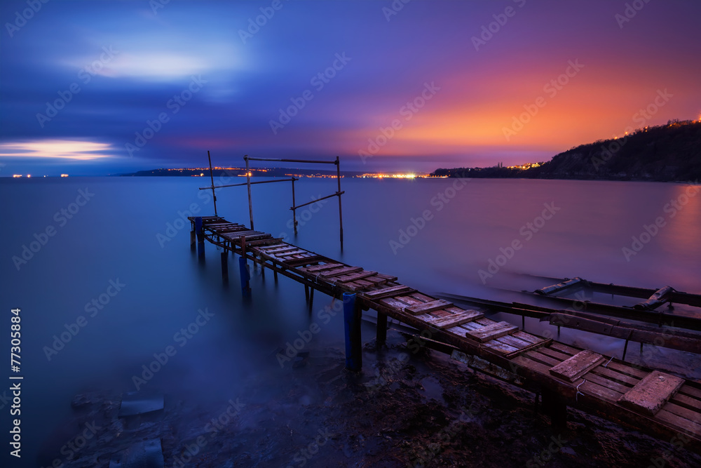 Fototapeta premium Long time exposure landscape with lake after sunset