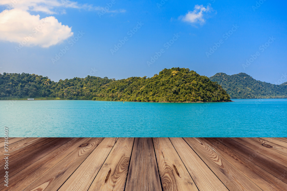 Fototapeta premium Wood floor and blue sea with island