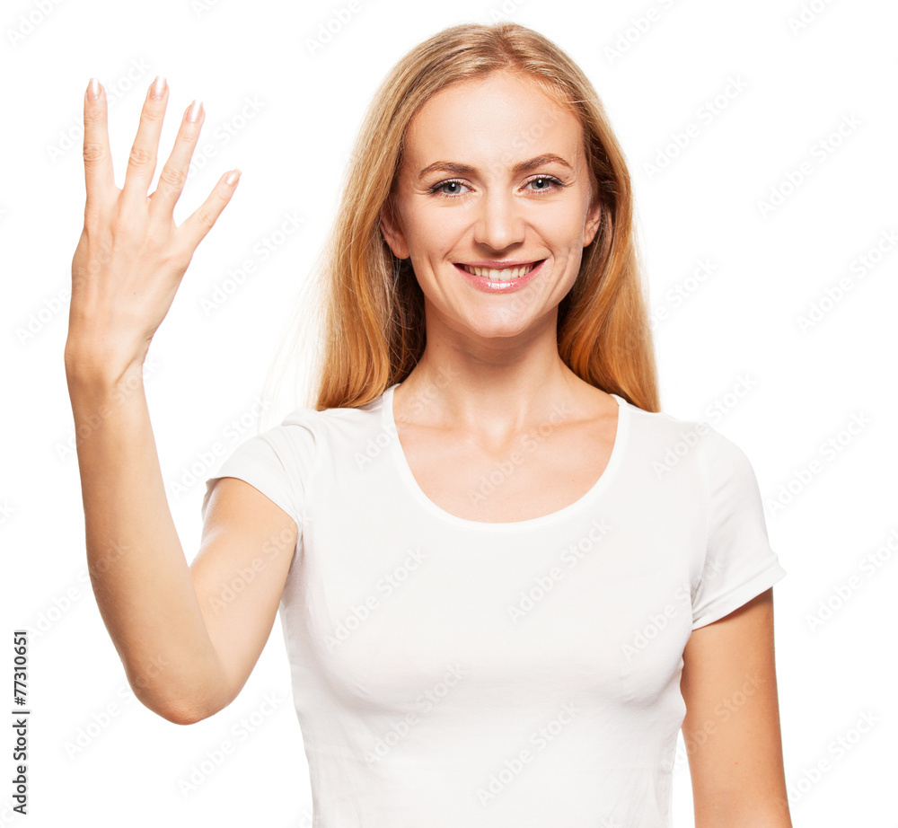 Woman at white background. Young female shows gesture four Woman at white background. Young female shows gesture four