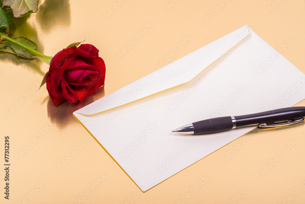 love letter and a rose on a golden background love letter and a rose on a golden background